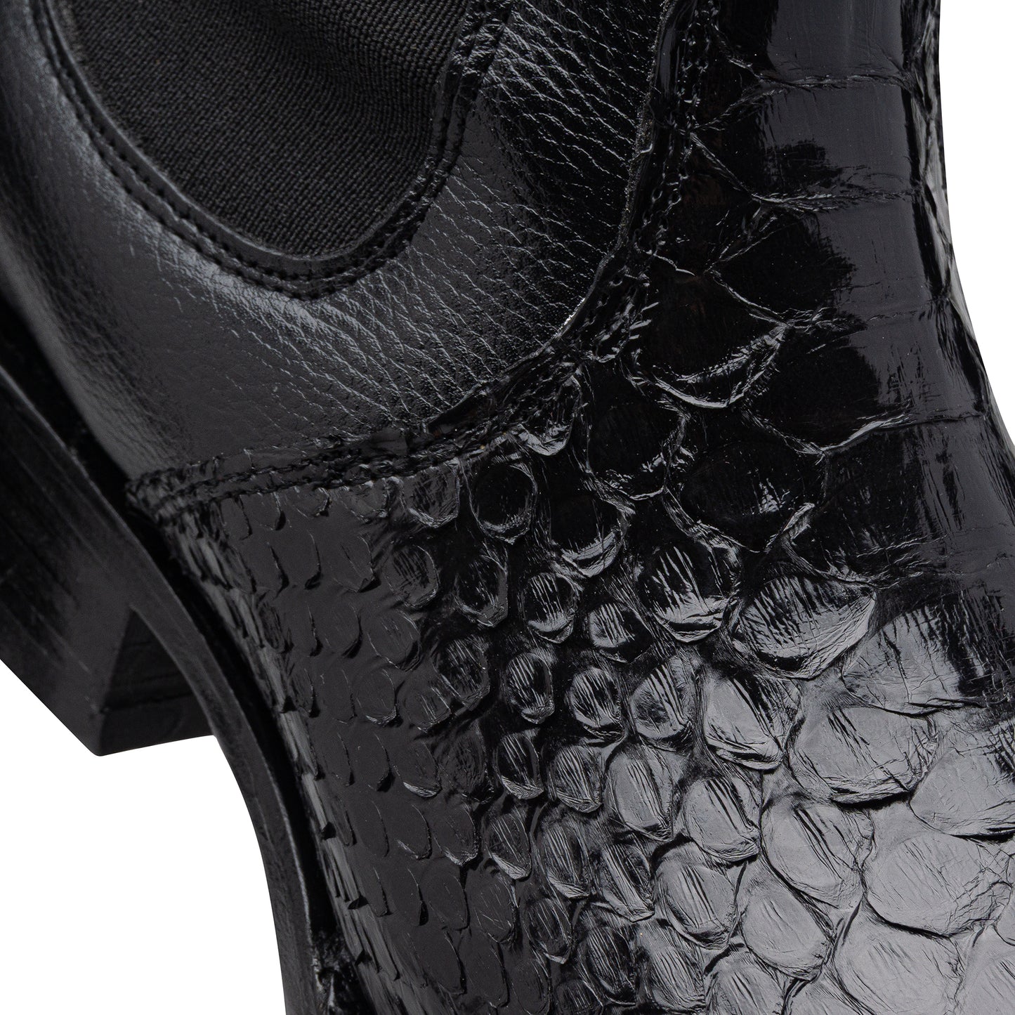 Quirón model python leather ankle boot with grafted sole