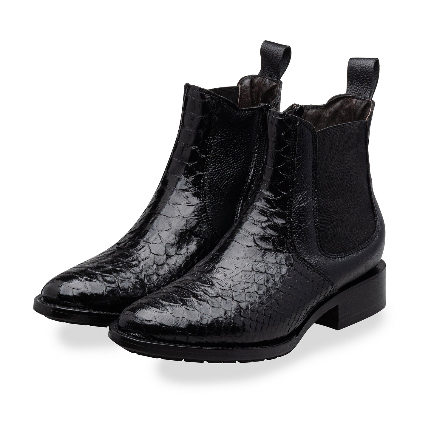 Quirón model python leather ankle boot with grafted sole