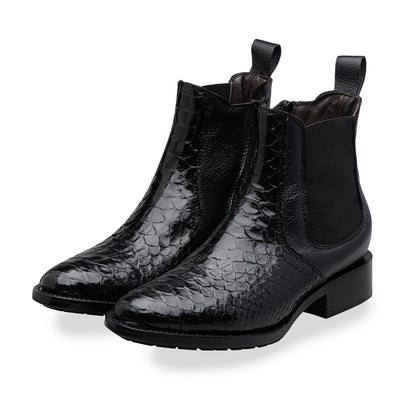 Quirón model python leather ankle boot with grafted sole