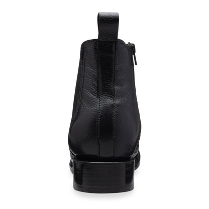 Quirón model python leather ankle boot with grafted sole