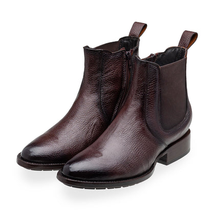 Quirón model python leather ankle boot with grafted sole