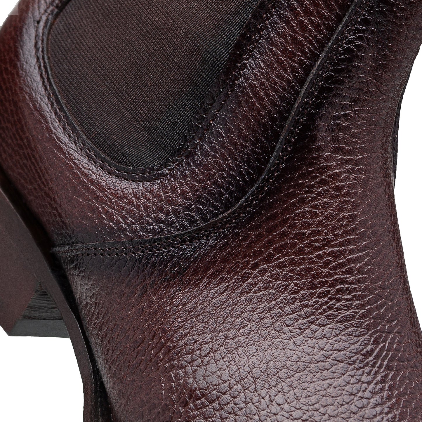 Quirón model python leather ankle boot with grafted sole