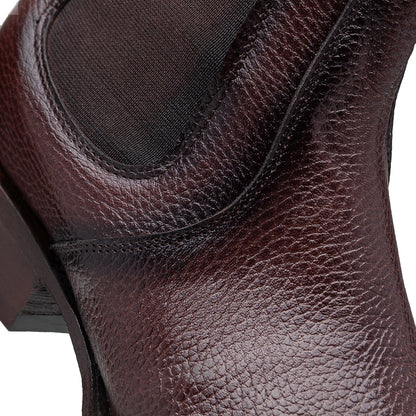 Quirón model python leather ankle boot with grafted sole
